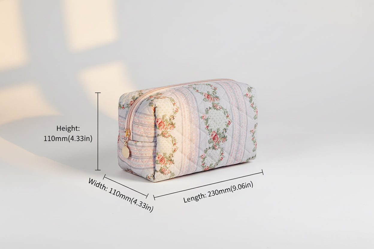 Floral patterned toiletry bag with measurements on a white background